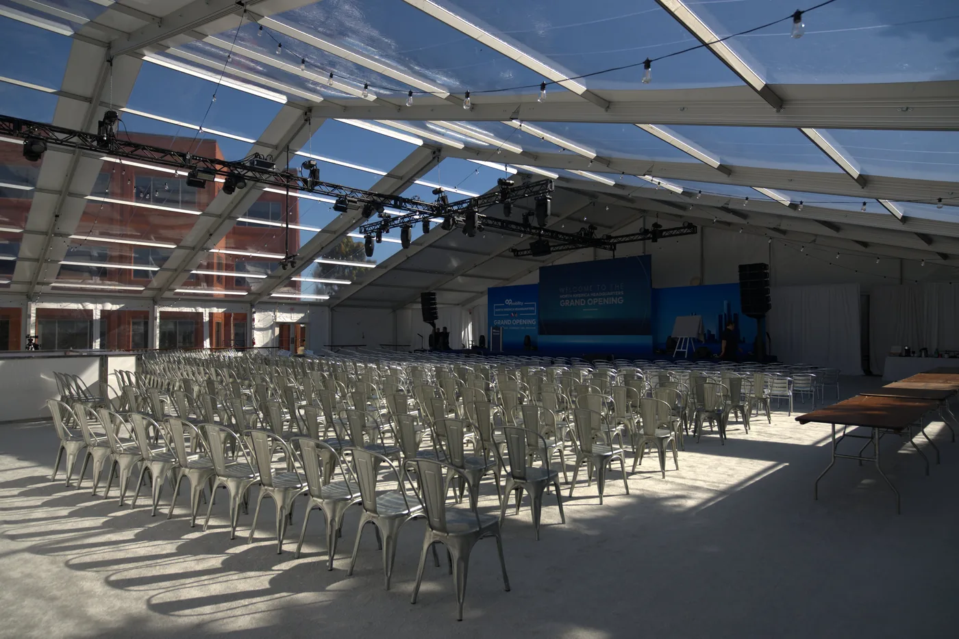 Clear top frame tent setup for outdoor event in Michigan with climate control